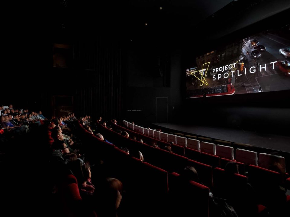 Wide view of the movie theatre when movie starts playing